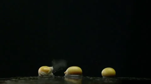 Popcorn popping, Slow Motion Stock Footage