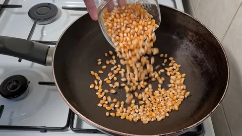 Popcorn Is Poured Into The Pan Stock Footage 164656861