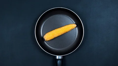 Popcorn is prepared on a black background. 4k. Stop Motion. Stock-Footage 87166336