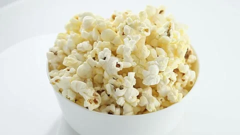 Popcorn salted corn, cooked, in white, bowl, rotation 動画素材 150390100
