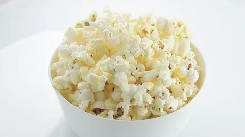 Popcorn salted corn, cooked, in white, bowl, rotation Stock Footage 150638361