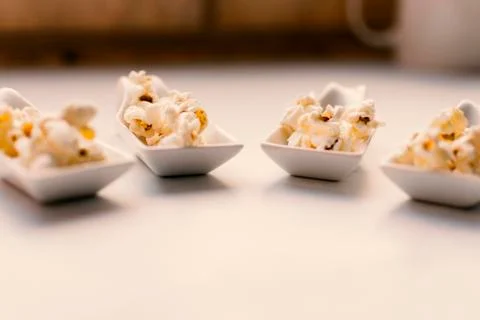 Popcorn in a spoon. Stock Photos