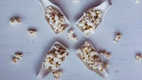 Popcorn in a spoon. Stock Photos