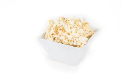 Popcorn in a square shape bowl 写真素材