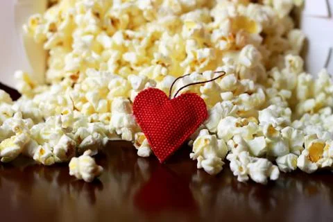 Popcorn stack with heart shape Stock Photos