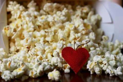 Popcorn stack with heart shape Stock Photos