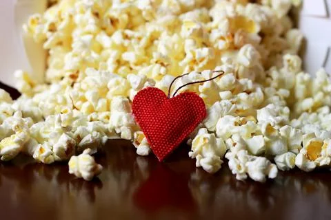 Popcorn stack with heart shape Stock Photos