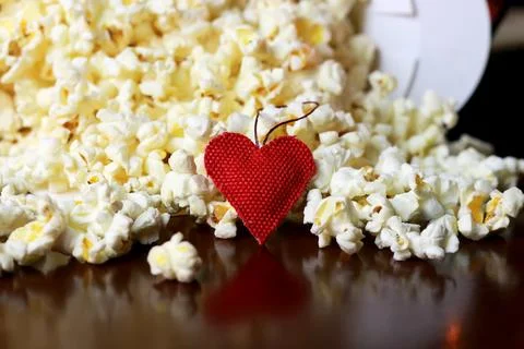 Popcorn stack with heart shape Stock Photos