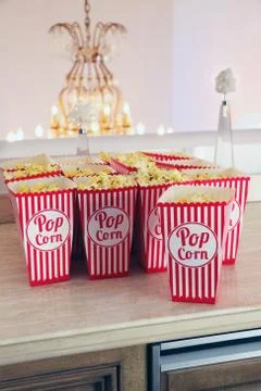 Popcorn is on the table at home Stock Photos
