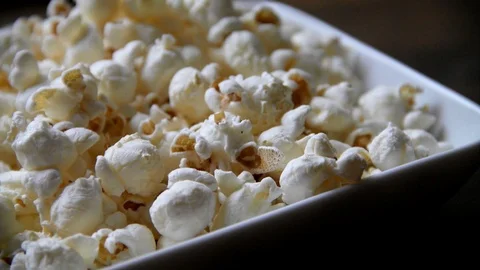 Popcorn on a table on wood close up Stock Footage 95046118