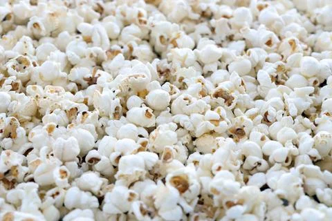 Popcorn texture background. Big amount of popcorn as pattern 스톡 사진
