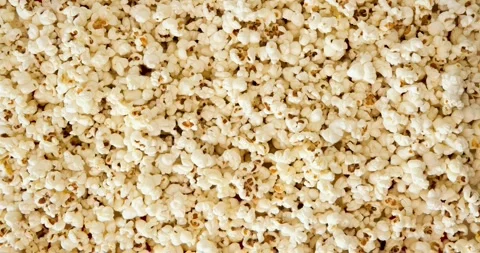 Popcorn texture. Looped 4K stop motion animation Vídeos de archivo 345118651