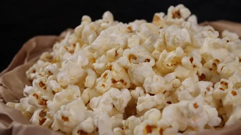 Popcorn turning in slow motion, Close-up of popcorn Stock-Footage 143843252