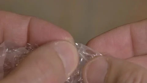 Popping Bubble Wrap Stock-Footage 220747982