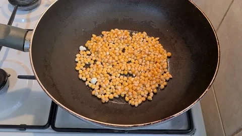 Popping Popcorn Stock Footage 157443542