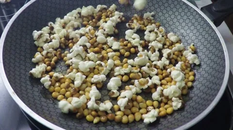 Popping popcorn in slow motion Stock Footage 46223806