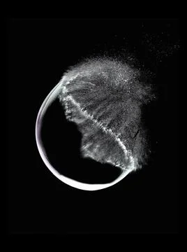 Popping Soap Bubble Exploding on Black Background Stock Photos