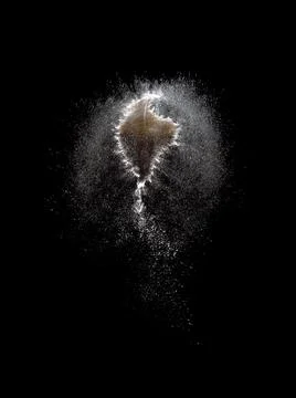 Popping Soap Bubble Exploding on Black Background Stock Photos