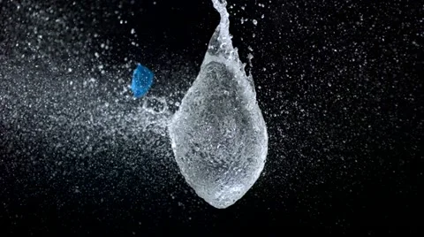 Popping water balloon, Slow Motion Stock Footage