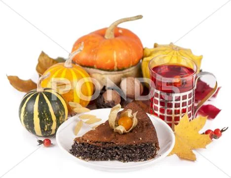 Poppy pie, autumn leaves and pumpkins Stock Photos
