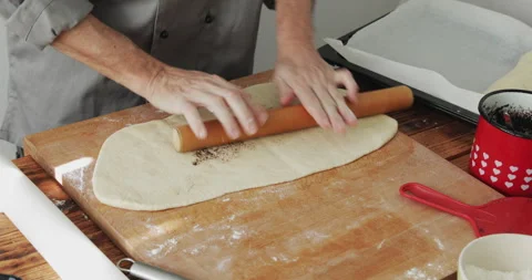 Poppy seed roll preparing stretching dough Stock Footage 304824103