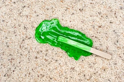 Popsicle dropped on carpet Stock Photos