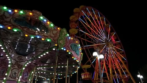 Popular Chair Swing Rides in Amusement Park. Carousel. Looped. Stock Footage