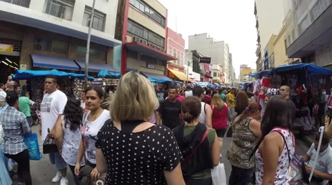 The popular commerce in Rua 25 de Marco (25 March Area). Stock Footage 45422623