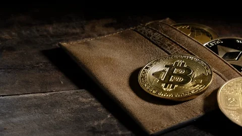 Popular Cryptocurrencies On Leather Wallet Stock Footage 92330552