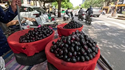 Popular fruit java plum is Reddy to sold in fruit   market in monsoon season Stock Footage 277322794