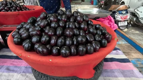 Popular fruit java plum is Reddy to sold in fruit   market in monsoon season Stock Footage 277322817