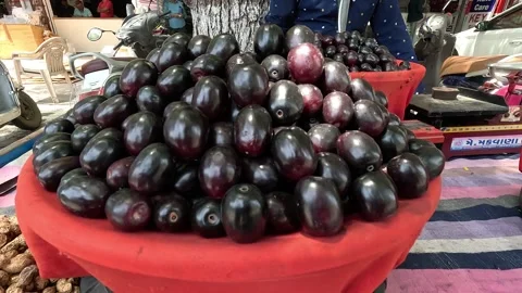 Popular fruit java plum is Reddy to sold in fruit   market in monsoon season Stock Footage 277322821