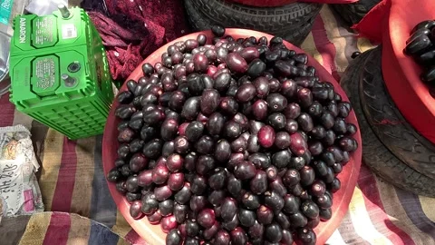 Popular fruit java plum is Reddy to sold in fruit   market in monsoon season Stock Footage 277322902