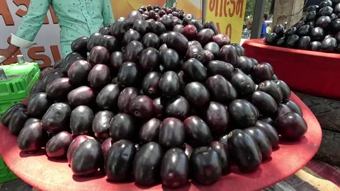 Popular fruit java plum is Reddy to sold in fruit   market in monsoon season Stock Footage 277322920