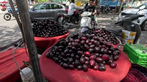 Popular fruit java plum is Reddy to sold in fruit   market in monsoon season Stock Footage 277322938