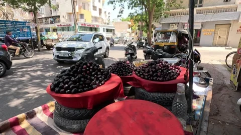 Popular fruit java plum is Reddy to sold in fruit   market in monsoon season Stock Footage 277322948
