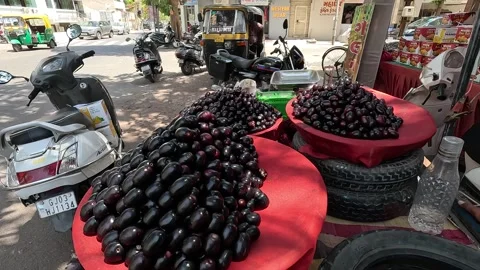 Popular fruit java plum is Reddy to sold in fruit   market in monsoon season Stock Footage 277322999