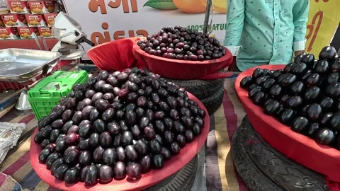 Popular fruit java plum is Reddy to sold in fruit   market in monsoon season Stock Footage 277323005