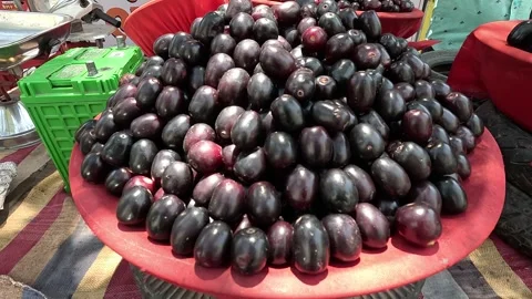 Popular fruit java plum is Reddy to sold in fruit   market in monsoon season Stock Footage 277323030
