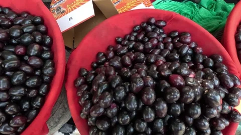 Popular fruit java plum is Reddy to sold in fruit   market in monsoon season Stock Footage 277323063