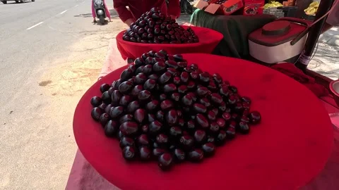 Popular fruit java plum is Reddy to sold in fruit   market in monsoon season Stock Footage 277323103