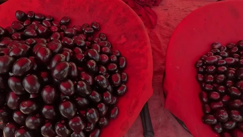 Popular fruit java plum is Reddy to sold in fruit   market in monsoon season Stock Footage 277323114