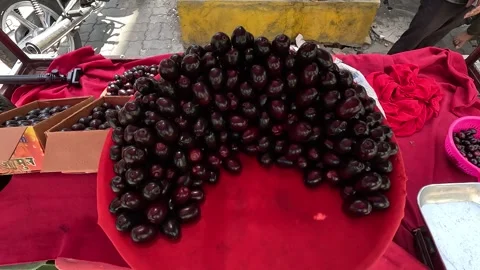 Popular fruit java plum is Reddy to sold in fruit   market in monsoon season Stock Footage 277323270