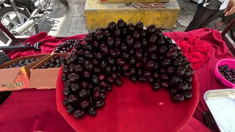 Popular fruit java plum is Reddy to sold in fruit   market in monsoon season Stock Footage 277323289