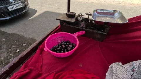 Popular fruit java plum is Reddy to sold in fruit   market in monsoon season Stock Footage 277323313