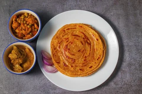 Popular Indian fried flat bread "laccha Paratha". Made of wheat flour. Stock Photos