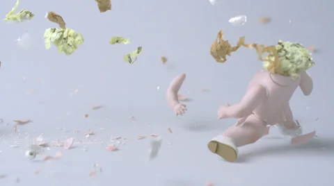 A porcelain doll being smashed, Slow Motion Stock Footage 31819406