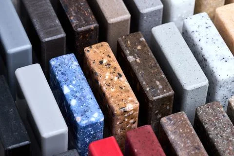Porcelain stoneware square samples as kitchen countertop examples of future Stock Photos
