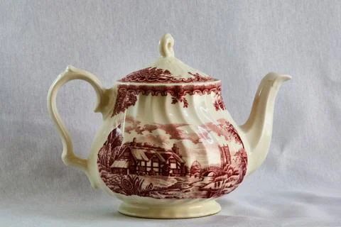 Porcelain teapot with landscape pattern Stock Photos