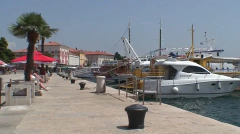 Porec Harbor Walk Stock Footage 1060171